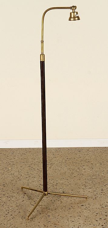 Appraisal: BRONZE LEATHER FLOOR LAMP JACQUES ADNET C An adjustable bronze