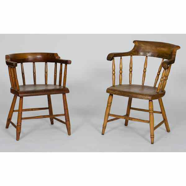 Appraisal: Captain's Chairs American th century Two captain's chairs in mixed