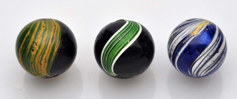 Appraisal: Lot of Indian Swirl Marbles Three multicolor Indians One is