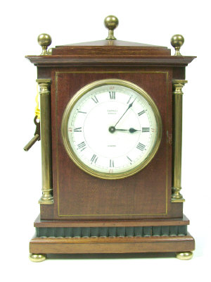 Appraisal: A mahogany cased mantel clock with gilt brass mounts of