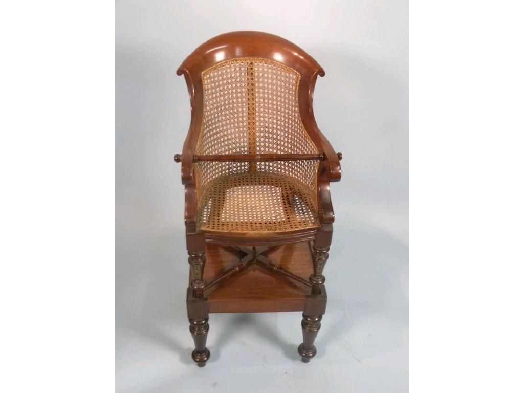 Appraisal: A mid thC mahogany and bergere child's high chair on