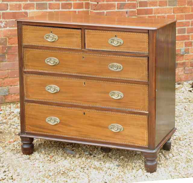 Appraisal: A TH CENTURY MAHOGANY CHEST of two short and three