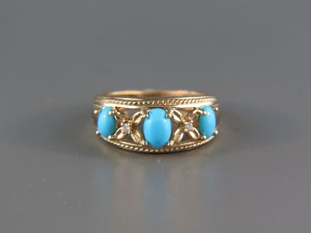 Appraisal: Turquoise and Diamond Ring a trio of oval cabachons with