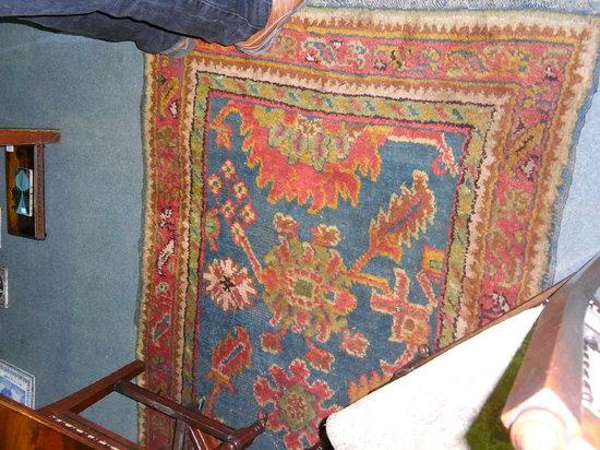 Appraisal: A PAIR OF TURKEY BLUE GROUND RUNNERS with traditional polychrome