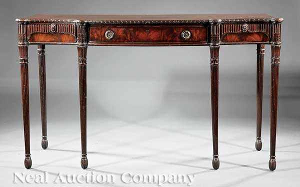 Appraisal: A Georgian-Style Carved Mahogany Server late th c shaped stiff