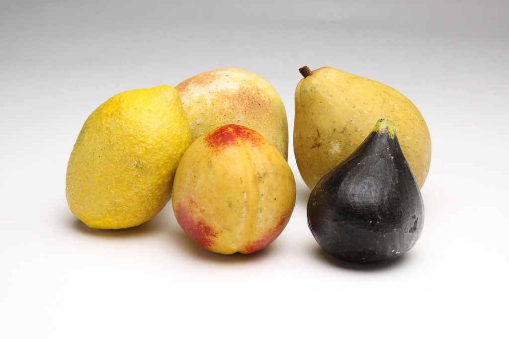 Appraisal: FIVE EUROPEAN STONE FRUITS Twentieth century Including a lemon two