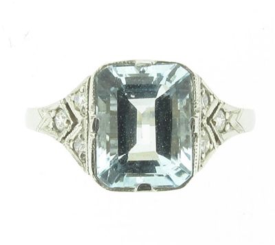 Appraisal: An aquamarine and diamond ring The emerald cut aquamarine in