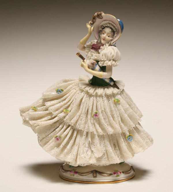 Appraisal: Large German Dresden lace porcelain figure a young woman carrying