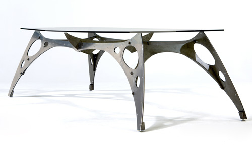 Appraisal: JONATHAN SINGLETON Stainless steel and aluminum dining table with angular