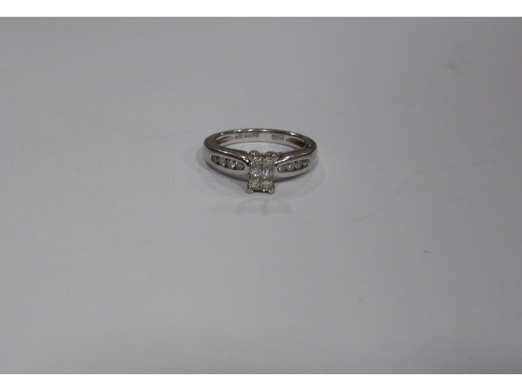 Appraisal: Platinum diamond set ring with six closely set princess cut