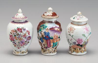 Appraisal: Three Chinese export tea caddies all with open scrollwork bases