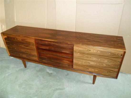 Appraisal: SKOVBY manufacturer A DANISH ROSEWOOD SIDEBOARD with five central drawers