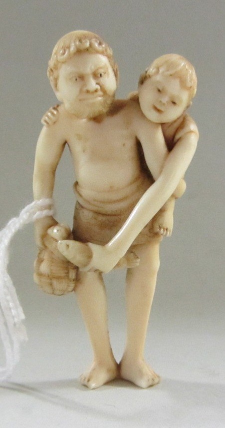 Appraisal: A Japanese ivory netsuke of Ashinaga carrying Tenaga on his