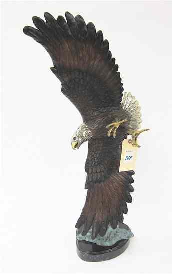 Appraisal: PATINATED BRONZE WILDLIFE SCULPTURE an American bald eagle in flight