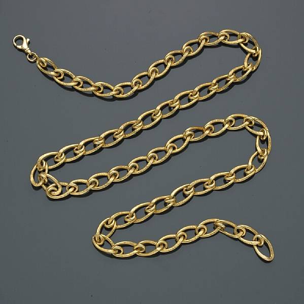 Appraisal: A eighteen karat gold curb link chain weighing approximately grams