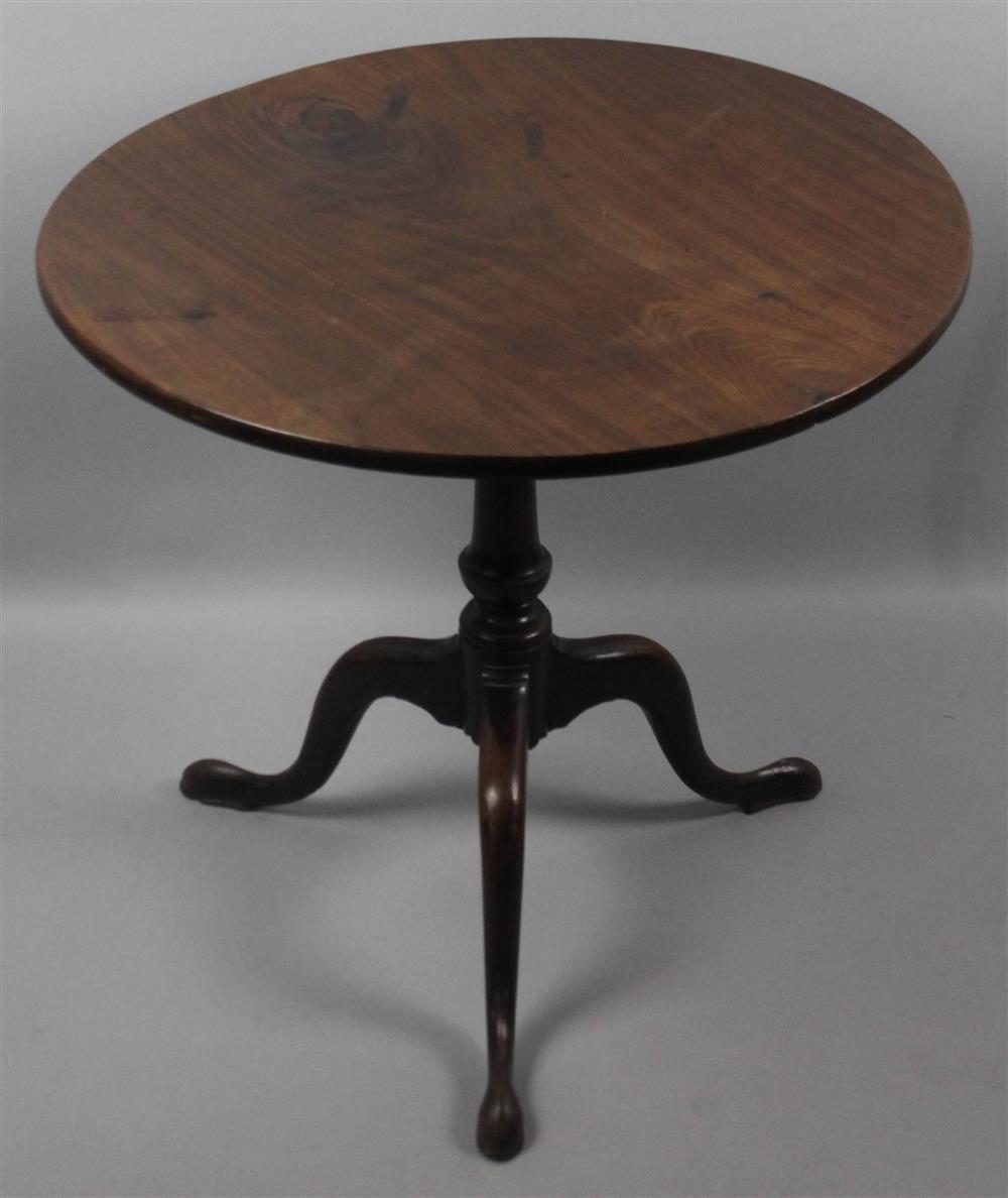 Appraisal: GEORGIAN MAHOGANY TEA TABLE having a round tilting top over