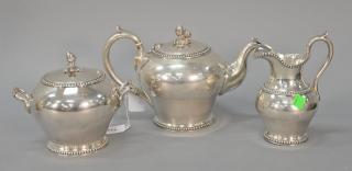 Appraisal: American silver three piece tea set with acorn and oak