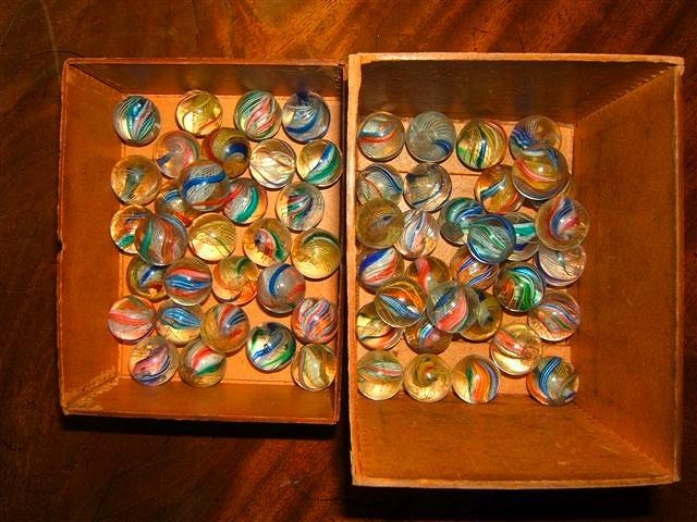 Appraisal: A collection of th Century glass marbles each with coloured