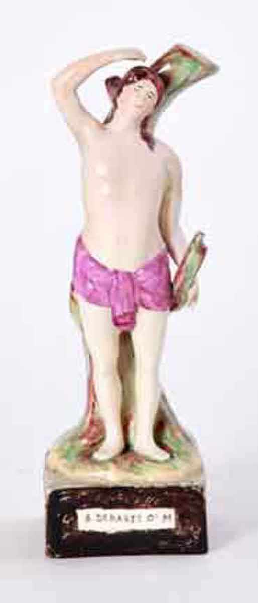 Appraisal: Staffordshire pottery St Sebastian figure th century after the Enoch