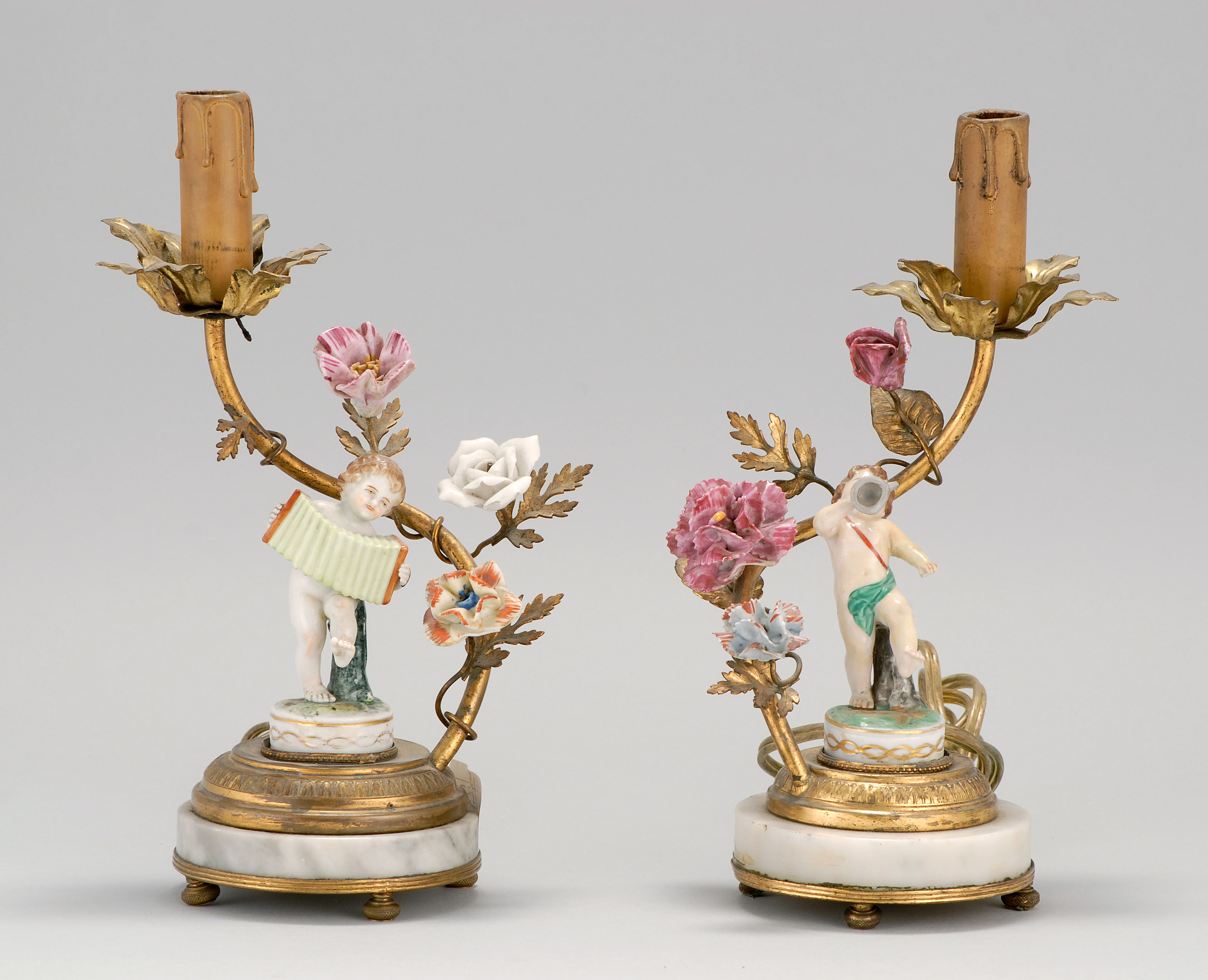 Appraisal: PAIR OF PORCELAIN-MOUNTED GILT-METAL ONE-LIGHT CANDELABRA Late th Early th