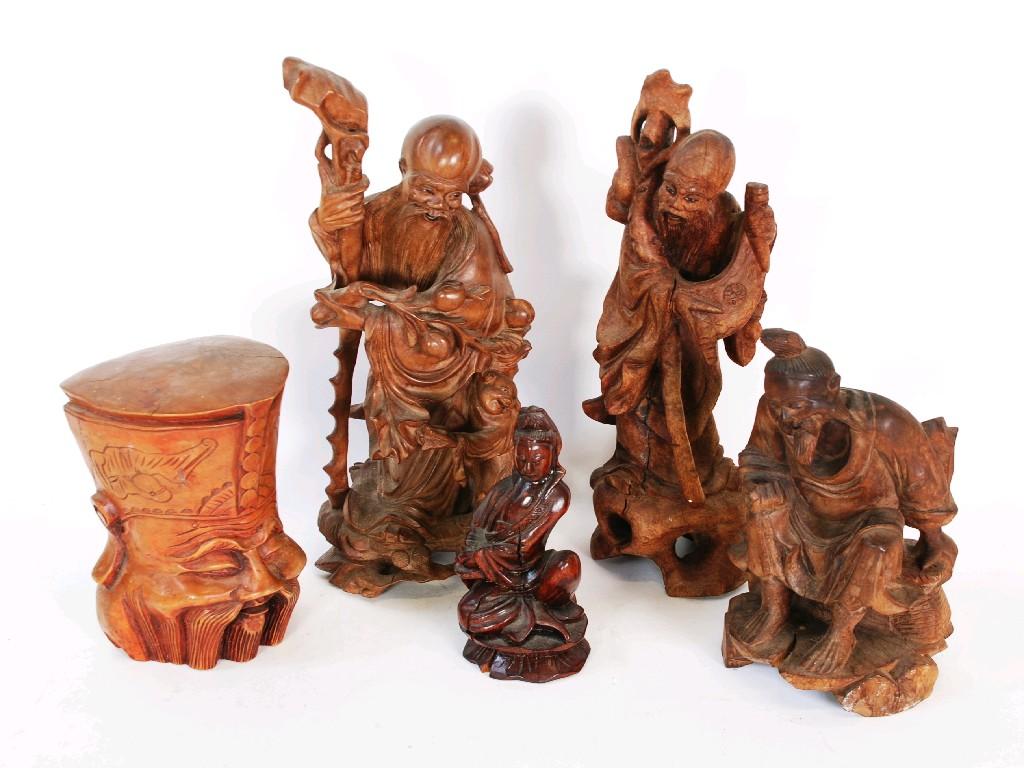 Appraisal: FOUR CHINESE CARVED REDWOOD FIGURES OR DEITIES AND A BUST