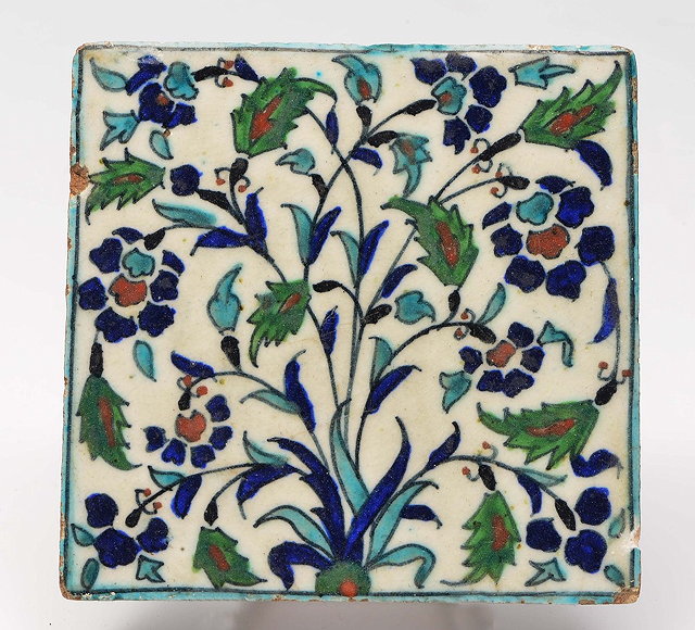 Appraisal: AN ISLAMIC POLYCHROME TILE decorated in the Iznik style th