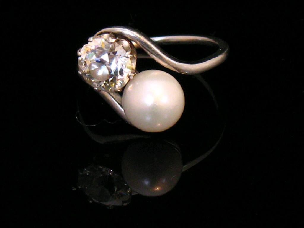 Appraisal: A 'S CONTINENTAL PEARL AND DIAMOND DRESS RING the marked