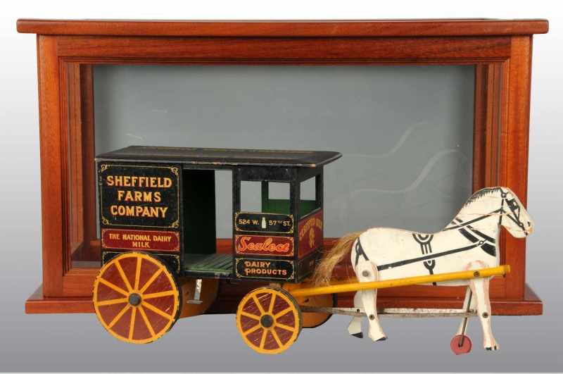 Appraisal: Wooden Sheffield Farms Horse-Drawn Milk Wagon Toy Description Nicely detailed