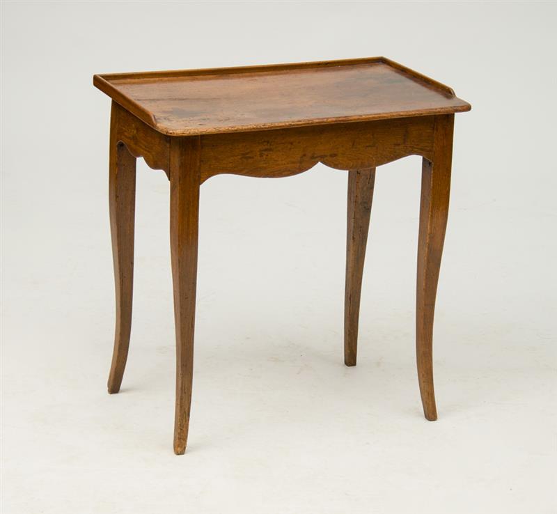 Appraisal: LOUIS XV PROVINCIAL FRUITWOOD SIDE TABLE The overhanging top with