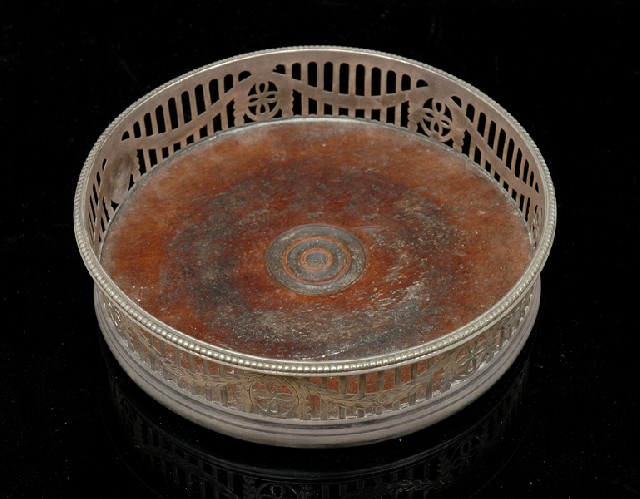 Appraisal: GEORGE III STERLING SILVER WINE COASTER Maker's mark rubbed London