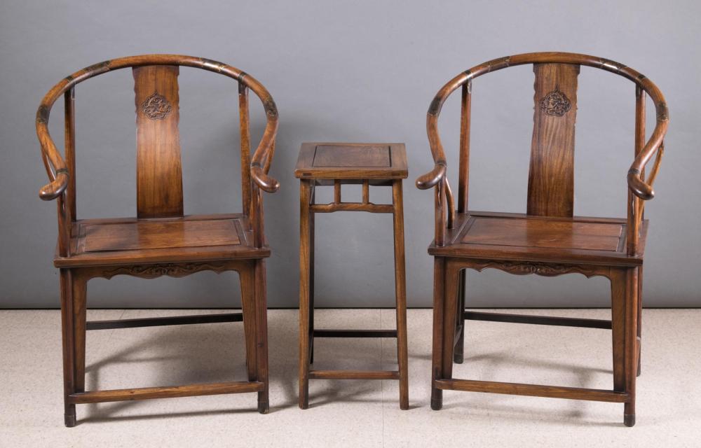 Appraisal: PAIR OF CHINESE MING STYLE HUALI ARMCHAIRS AND SIDE TABLE