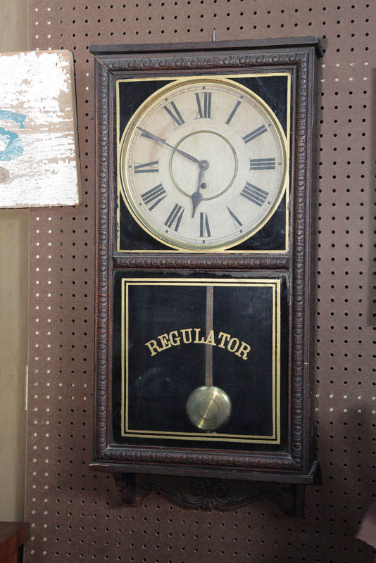 Appraisal: WATERBURY REGULATOR CLOCK With pendulum and key Traces of original