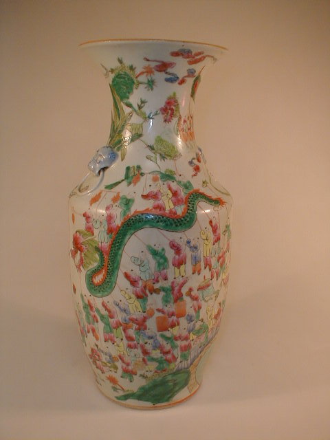 Appraisal: A thC Chinese famile rose Cantonese baluster vase embellished with