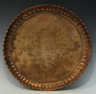 Appraisal: Large Middle Eastern Beaten Copper Tea Tray The plain center