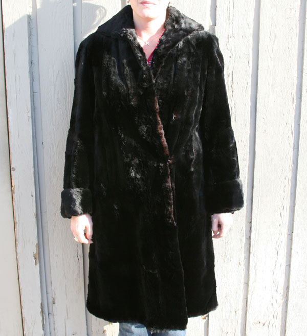 Appraisal: Vintage black seal fur coat and muff Petters Furs St