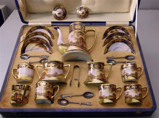 Appraisal: Noritake coffee service in presentation case with dark blue borders