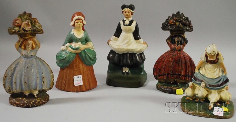 Appraisal: Five Painted Cast Iron and Metal Figural Doorstops two women