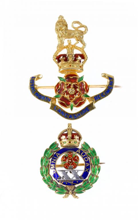 Appraisal: TWO GOLD AND ENAMEL SOLDIER'S SWEETHEART'S BROOCHES of the badges