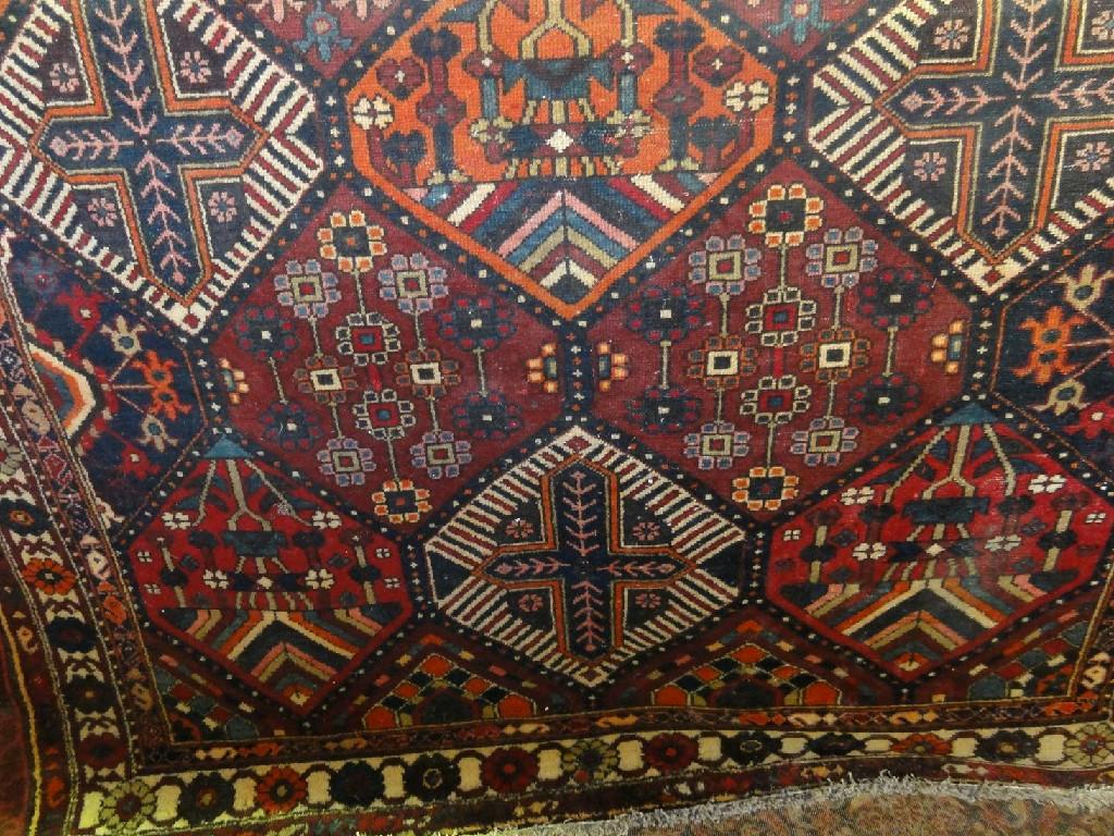 Appraisal: A Middle Eastern carpet with an overall polychrome geometric pattern