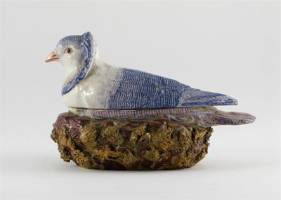 Appraisal: A Staffordshire pearlware box and cover modelled as a fancy