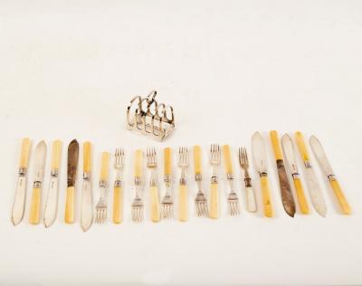 Appraisal: Nine pairs of fish knives and forks with silver blades