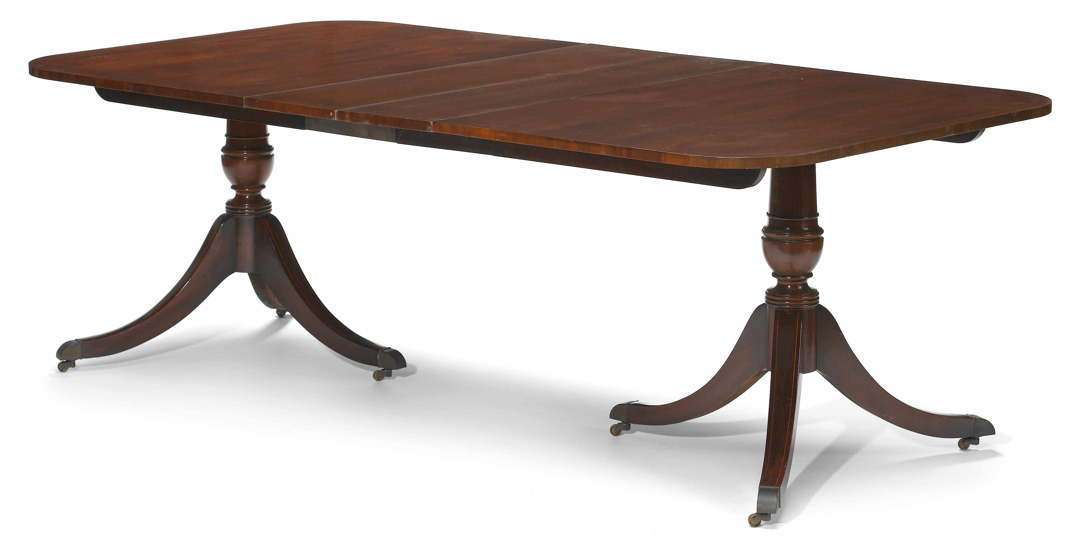 Appraisal: A George III style inlaid mahogany twin pedestal dining table