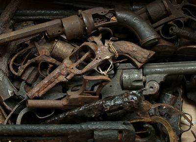 Appraisal: assorted gun relics mostly dug includes Colt Army and Navy