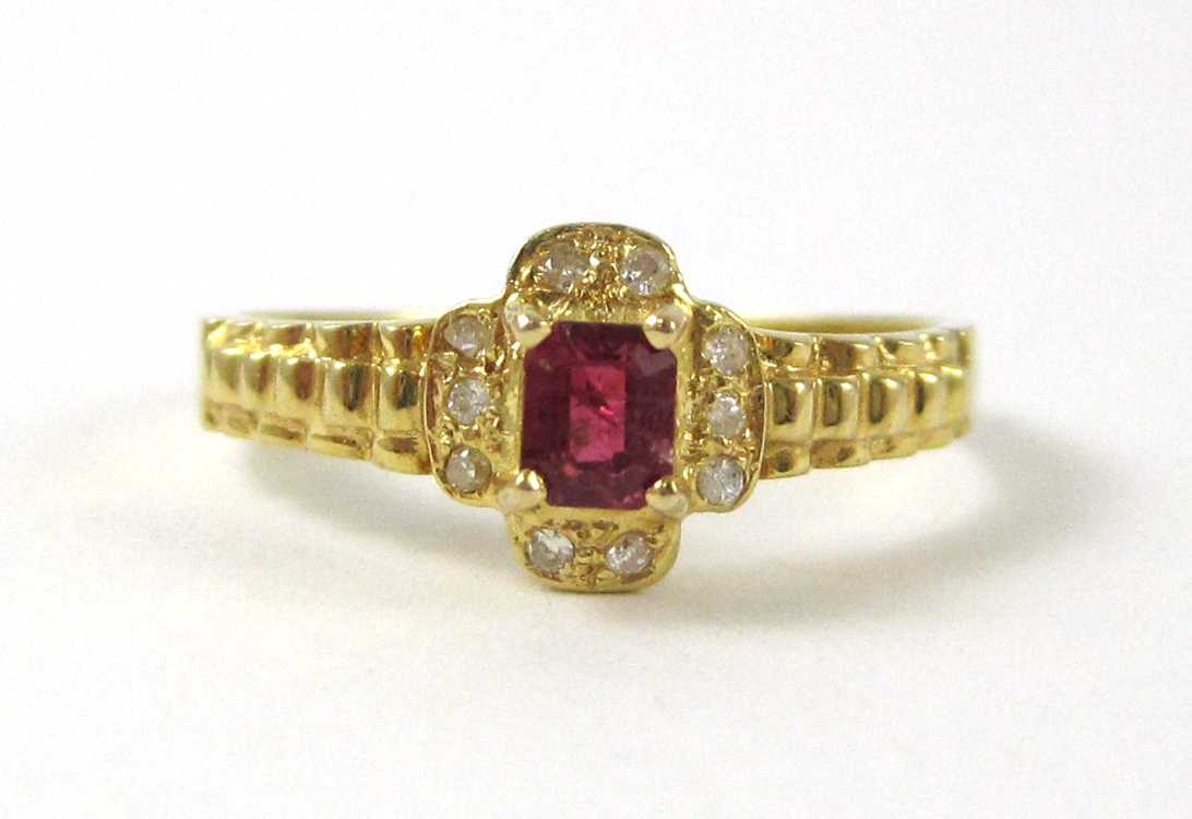 Appraisal: RUBY DIAMOND AND FOURTEEN KARAT GOLD RING with ten round-cut