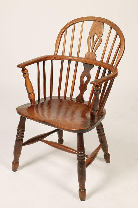 Appraisal: A BEECH AND ELM HOOP BACK WINDSOR CHAIR the low