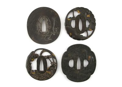 Appraisal: Four Japanese tsuba two decorated with leaves and flowers one