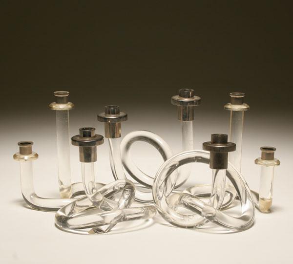 Appraisal: Dorothy Thorpe lot of five lucite knot candlesticks with chromed