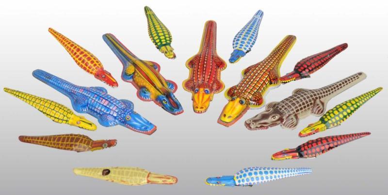 Appraisal: Lot of Tin Litho Alligator Clicker Toys Description Japanese Post-war