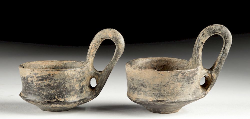 Appraisal: Pair of Etruscan Bucchero Kyathoi Classical World Southern Italy Etruria