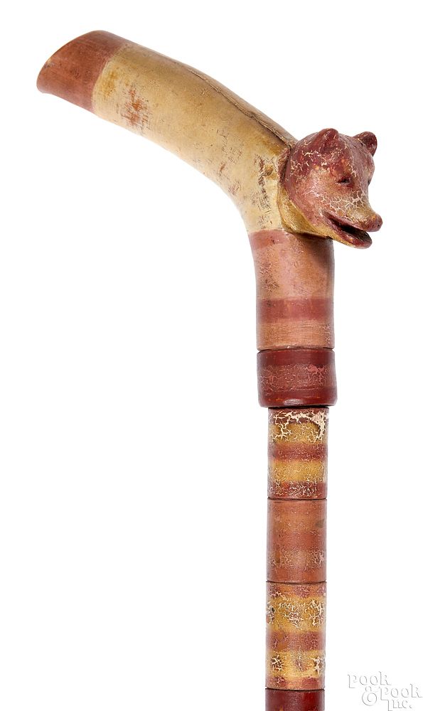 Appraisal: Carved and painted cane Carved and painted cane th c